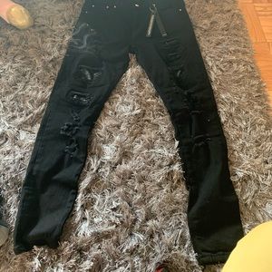 black amiri snake jeans